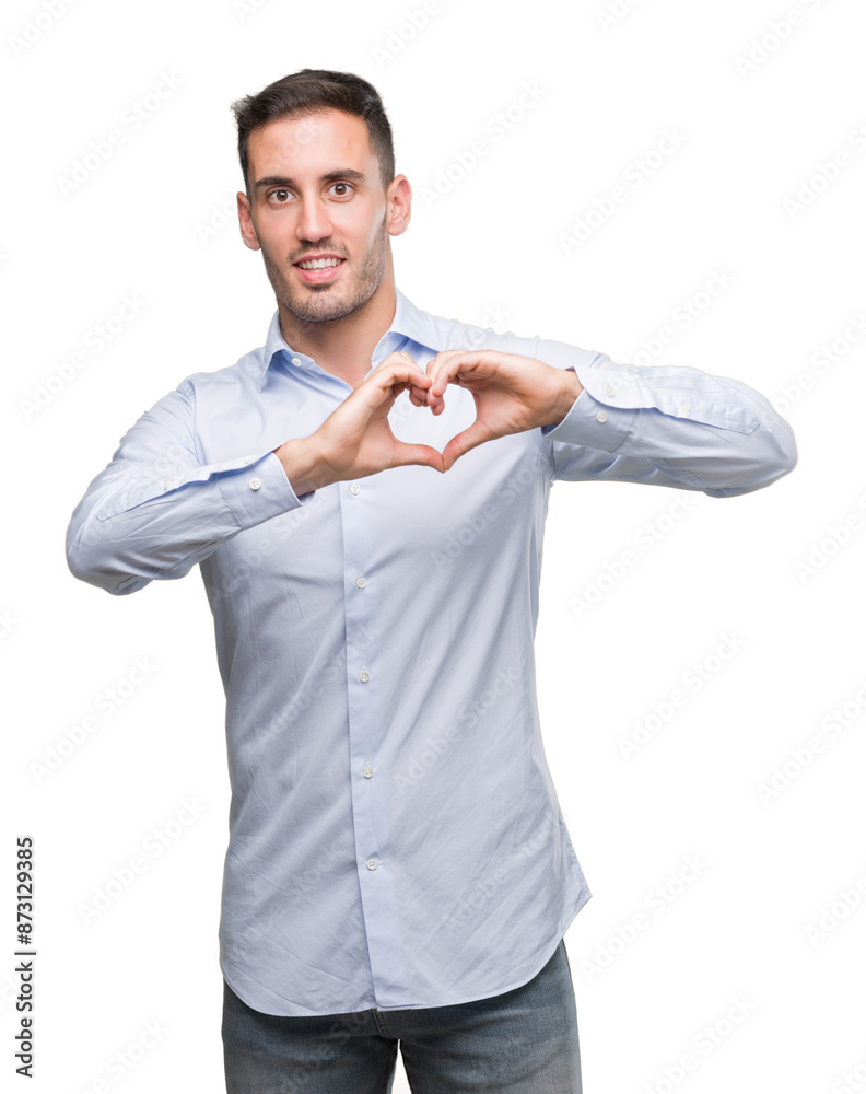 Handsome young businessman smiling in love showing heart symbol and shape with hands. Romantic concept. Handsome young businessman smiling in love showing heart symbol and shape with hands. Romantic concept.