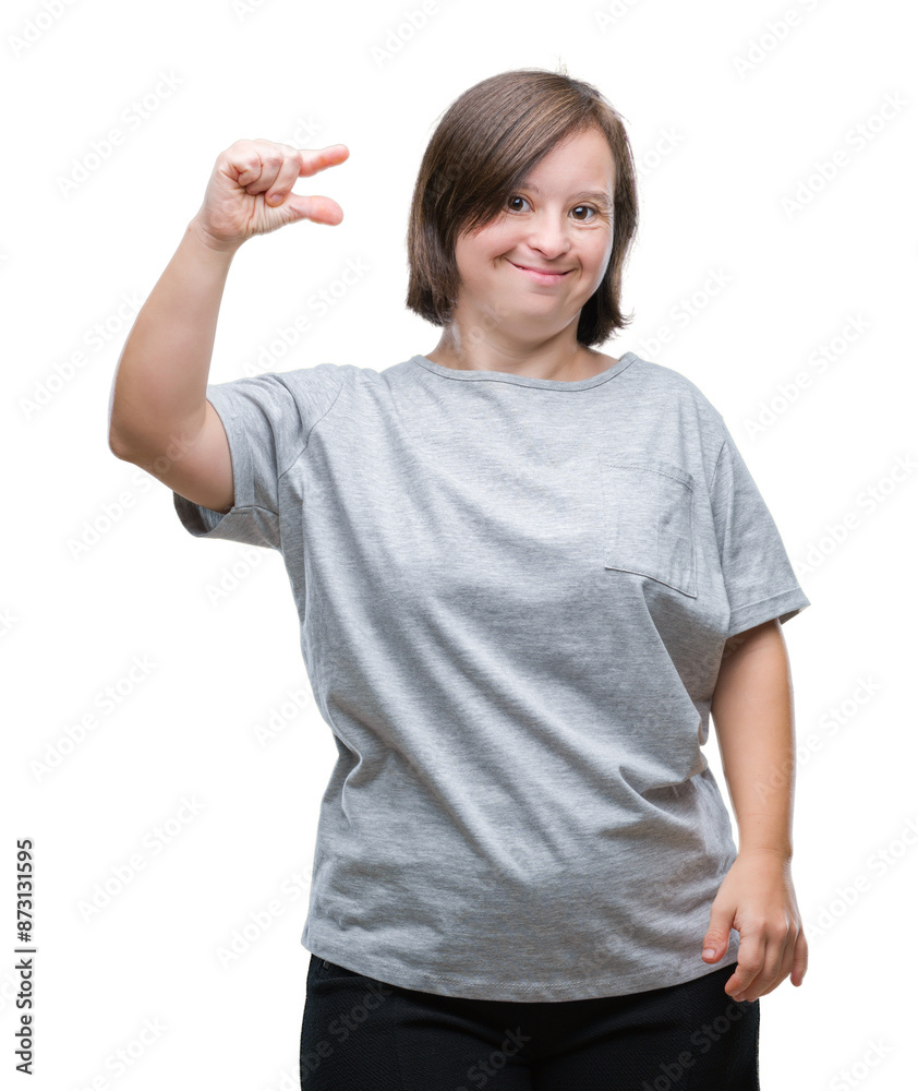 Fototapeta premium Young adult woman with down syndrome over isolated background smiling and confident gesturing with hand doing size sign with fingers while looking and the camera. Measure concept.