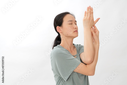 Beauty doing yoga with a white background