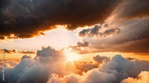 Above clouds sunset. Flying through heavenly beautiful sunny cloudscape. Amazing timelapse of fluffy clouds moving softly in the sky and the sun shining above the clouds with beautiful rays