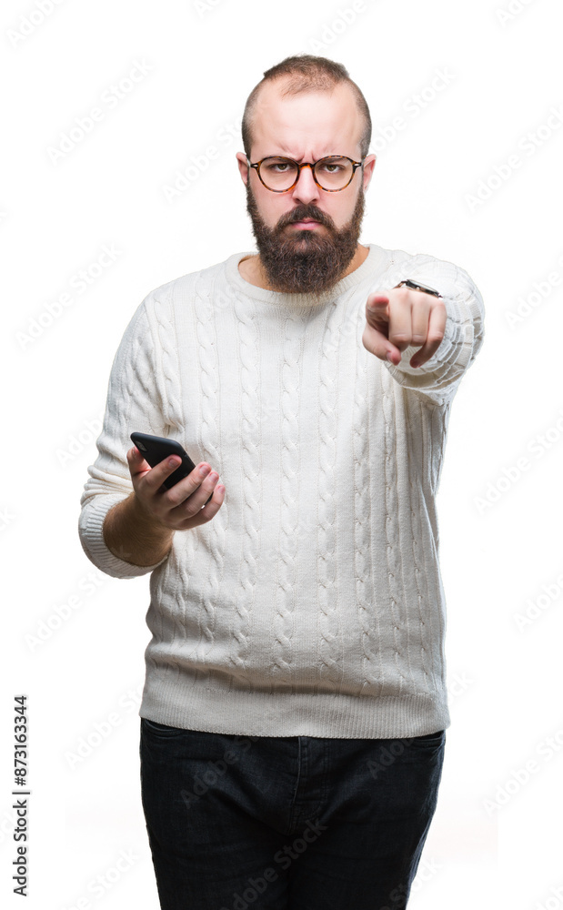 Young caucasian hipster man texting sending message using smartphone over isolated background pointing with finger to the camera and to you, hand sign, positive and confident gesture from the front Young caucasian hipster man texting sending message using smartphone over isolated background pointing with finger to the camera and to you, hand sign, positive and confident gesture from the front