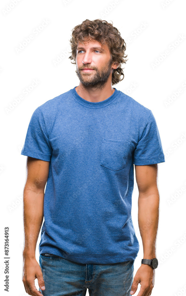 Handsome hispanic model man over isolated background looking away to side with smile on face, natural expression. Laughing confident. Handsome hispanic model man over isolated background looking away to side with smile on face, natural expression. Laughing confident.