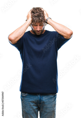 Handsome hispanic model man wearing winter sweater over isolated background suffering from headache desperate and stressed because pain and migraine. Hands on head.