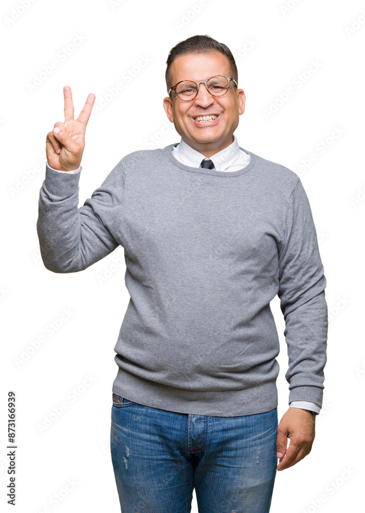 Middle age bussines arab man wearing glasses over isolated background showing and pointing up with fingers number two while smiling confident and happy. Middle age bussines arab man wearing glasses over isolated background showing and pointing up with fingers number two while smiling confident and happy.