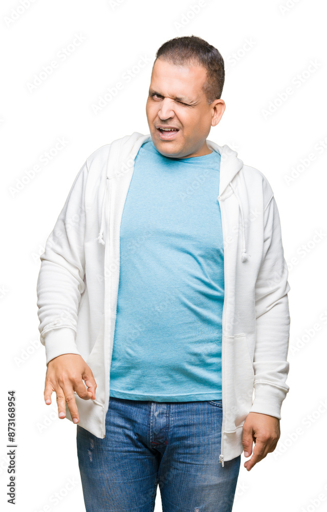 Middle age arab man wearing sweatshirt over isolated background winking looking at the camera with sexy expression, cheerful and happy face. Middle age arab man wearing sweatshirt over isolated background winking looking at the camera with sexy expression, cheerful and happy face.
