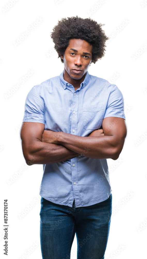 Afro american man over isolated background skeptic and nervous, disapproving expression on face with crossed arms. Negative person. Afro american man over isolated background skeptic and nervous, disapproving expression on face with crossed arms. Negative person.