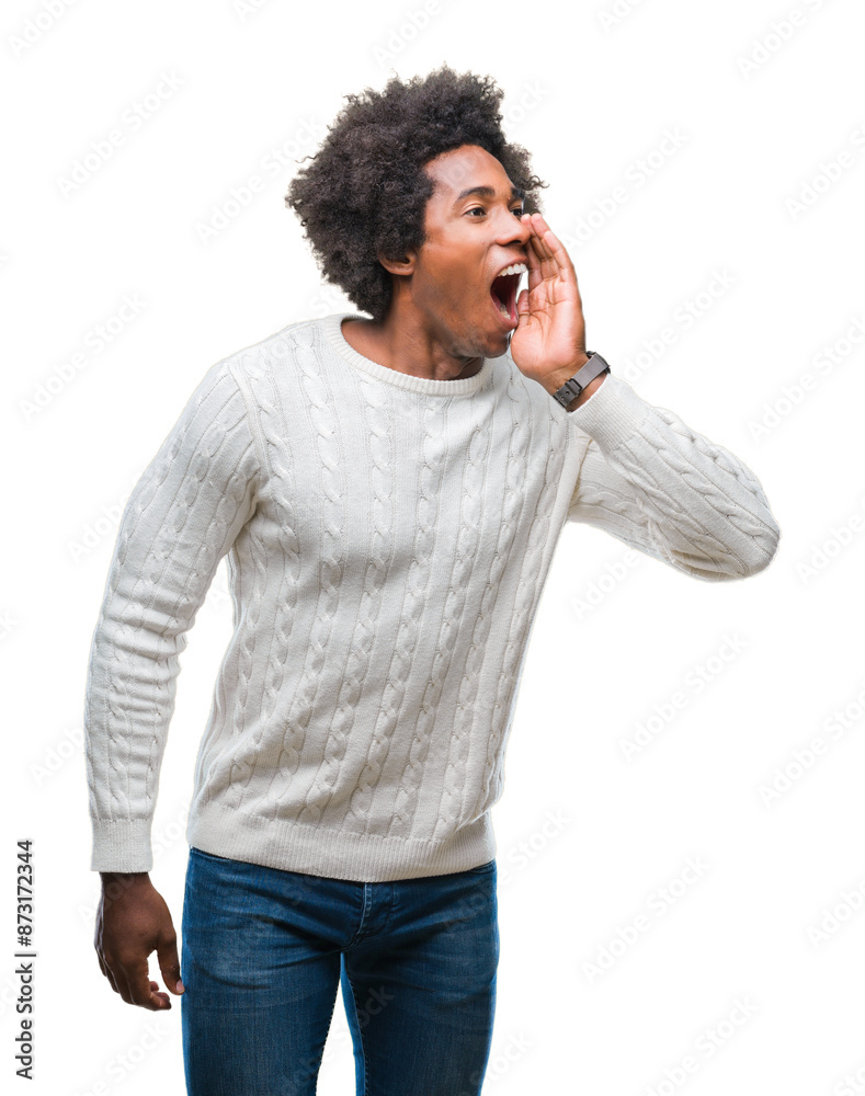 Afro american man over isolated background shouting and screaming loud to side with hand on mouth. Communication concept. Afro american man over isolated background shouting and screaming loud to side with hand on mouth. Communication concept.