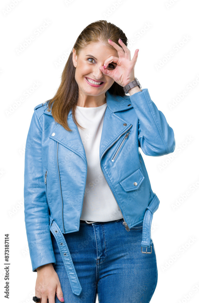 Beautiful middle age mature woman wearing fashion leather jacket over isolated background doing ok gesture with hand smiling, eye looking through fingers with happy face. Beautiful middle age mature woman wearing fashion leather jacket over isolated background doing ok gesture with hand smiling, eye looking through fingers with happy face.