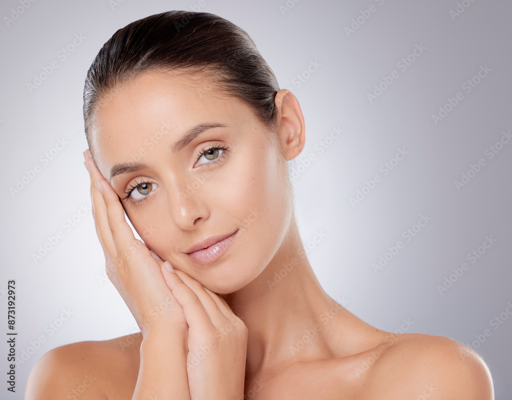Woman, portrait and hands in studio for skincare or wellness aesthetic, clean and calm for dermatology. Female person, gray background and natural glow, self care or confidence with transformation Woman, portrait and hands in studio for skincare or wellness aesthetic, clean and calm for dermatology. Female person, gray background and natural glow, self care or confidence with transformation