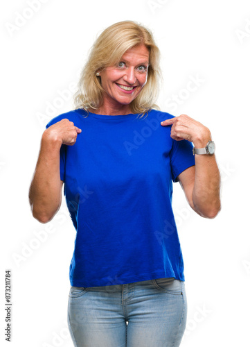 Middle age blonde woman over isolated background looking confident with smile on face, pointing oneself with fingers proud and happy.