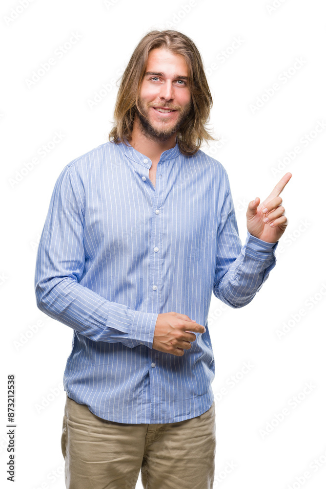 Young handsome man with long hair over isolated background with a big smile on face, pointing with hand and finger to the side looking at the camera. Young handsome man with long hair over isolated background with a big smile on face, pointing with hand and finger to the side looking at the camera.