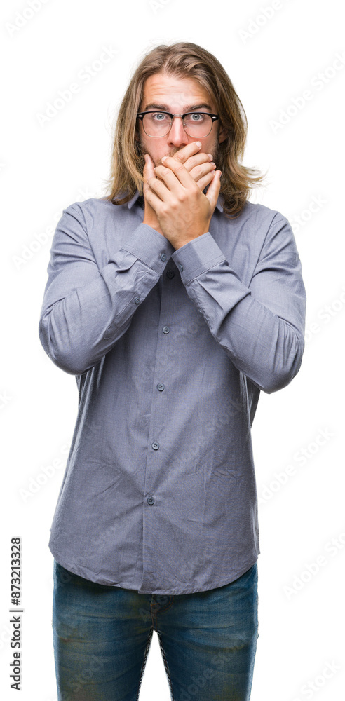 Young handsome business man with long hair over isolated background shocked covering mouth with hands for mistake. Secret concept. Young handsome business man with long hair over isolated background shocked covering mouth with hands for mistake. Secret concept.