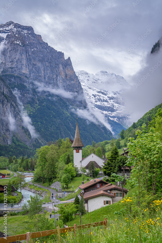 amazing beautiful place of village where we can see huge mountain and many water fall background village and yard like heaven lauterbrunnen Switzerland amazing beautiful place of village where we can see huge mountain and many water fall background village and yard like heaven lauterbrunnen Switzerland