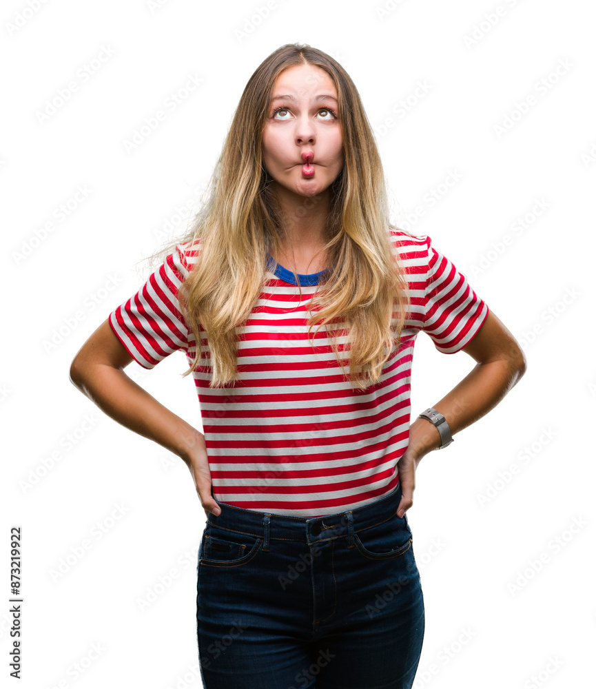Young beautiful blonde woman over isolated background making fish face with lips, crazy and comical gesture. Funny expression. Young beautiful blonde woman over isolated background making fish face with lips, crazy and comical gesture. Funny expression.