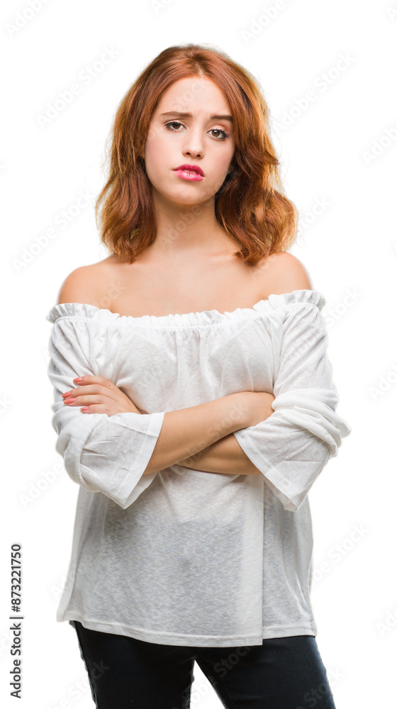 Young beautiful woman over isolated background skeptic and nervous, disapproving expression on face with crossed arms. Negative person. Young beautiful woman over isolated background skeptic and nervous, disapproving expression on face with crossed arms. Negative person.
