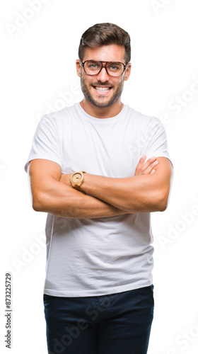 Young handsome man wearing glasses over isolated background happy face smiling with crossed arms looking at the camera. Positive person.