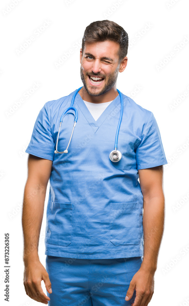 Young handsome doctor surgeon man over isolated background winking looking at the camera with sexy expression, cheerful and happy face. Young handsome doctor surgeon man over isolated background winking looking at the camera with sexy expression, cheerful and happy face.