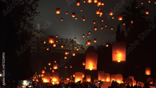 Indonesian people gathering together to release lantern during buddhism Vaisak Day celebration at Borobudur Temple.