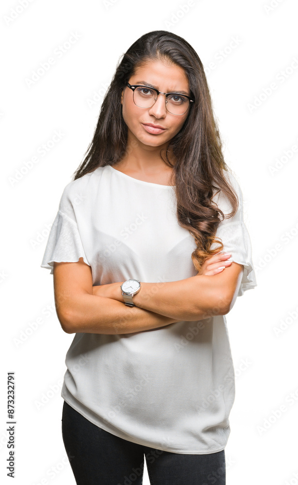 Young beautiful arab woman wearing glasses over isolated background skeptic and nervous, disapproving expression on face with crossed arms. Negative person. Young beautiful arab woman wearing glasses over isolated background skeptic and nervous, disapproving expression on face with crossed arms. Negative person.