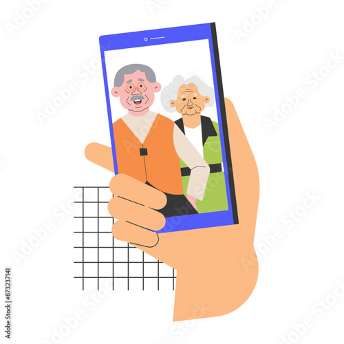 A person holding a smartphone with a photo of an elderly couple on the screen. The elderly couple is smiling and posing for a selfie, conveying a warm family connection and the use of technology.