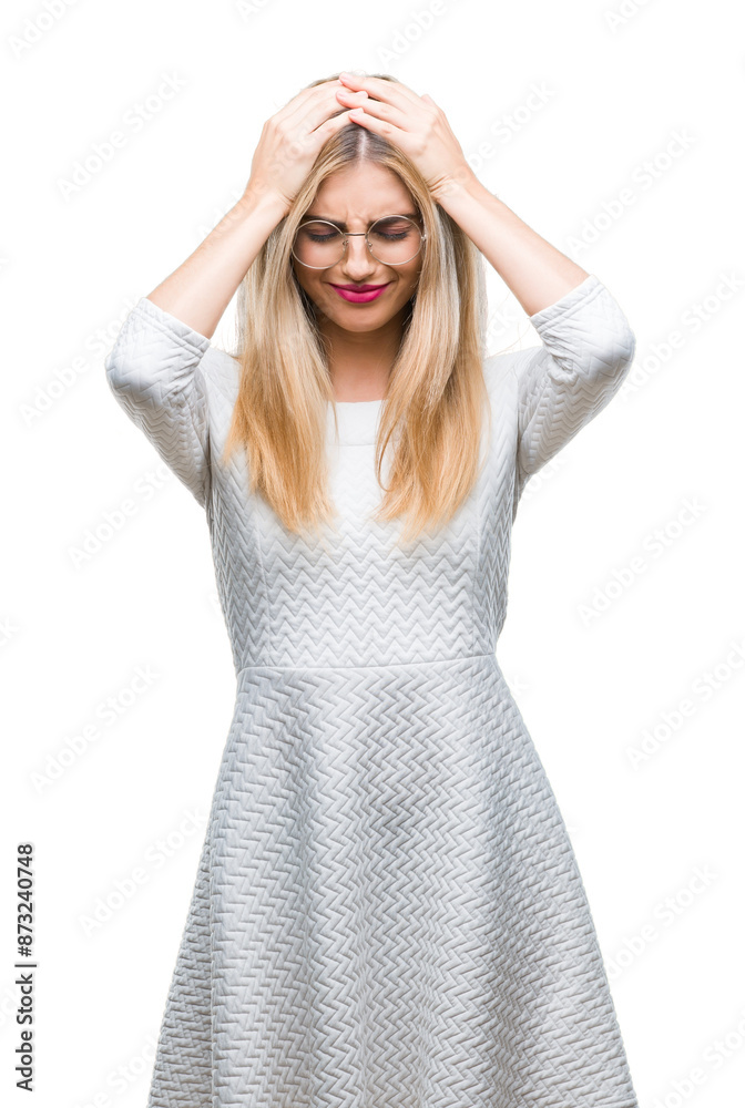 Young beautiful blonde woman wearing glasses over isolated background suffering from headache desperate and stressed because pain and migraine. Hands on head. Young beautiful blonde woman wearing glasses over isolated background suffering from headache desperate and stressed because pain and migraine. Hands on head.