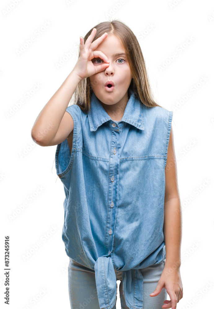 Young beautiful girl over isolated background doing ok gesture shocked with surprised face, eye looking through fingers. Unbelieving expression. Young beautiful girl over isolated background doing ok gesture shocked with surprised face, eye looking through fingers. Unbelieving expression.