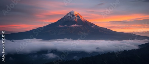 clouds cover peak, red background sky, pink foreground sky