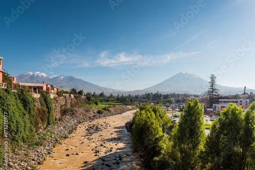 view of the Chili River and the volcanoes of Arequipa, Misti and Chachani from the Bolognesi Bridge photo