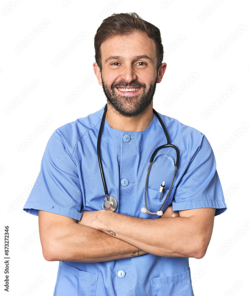 Hispanic male nurse in studio laughing and having fun. Hispanic male nurse in studio laughing and having fun.