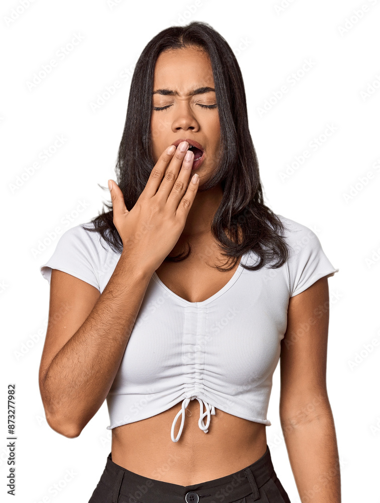 Young filipino woman yawning showing a tired gesture covering mouth with hand. Young filipino woman yawning showing a tired gesture covering mouth with hand.
