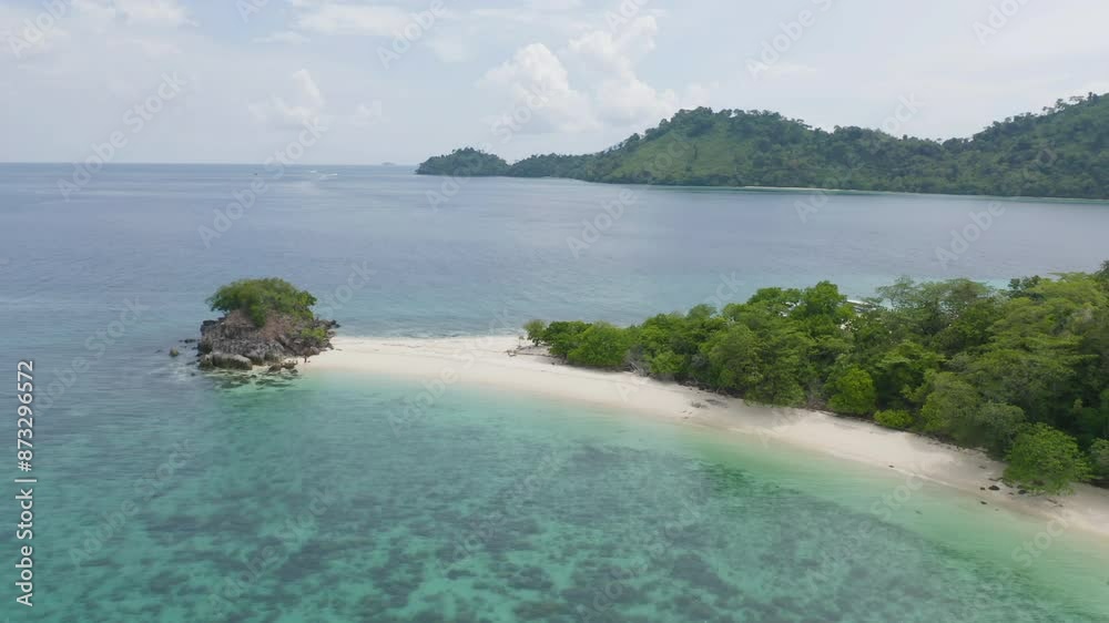 Aerial view of clear blue turquoise seawater, Andaman sea in Phuket island in summer season, Thailand. Water in ocean pattern texture wallpaper background. Aerial view of clear blue turquoise seawater, Andaman sea in Phuket island in summer season, Thailand. Water in ocean pattern texture wallpaper background.