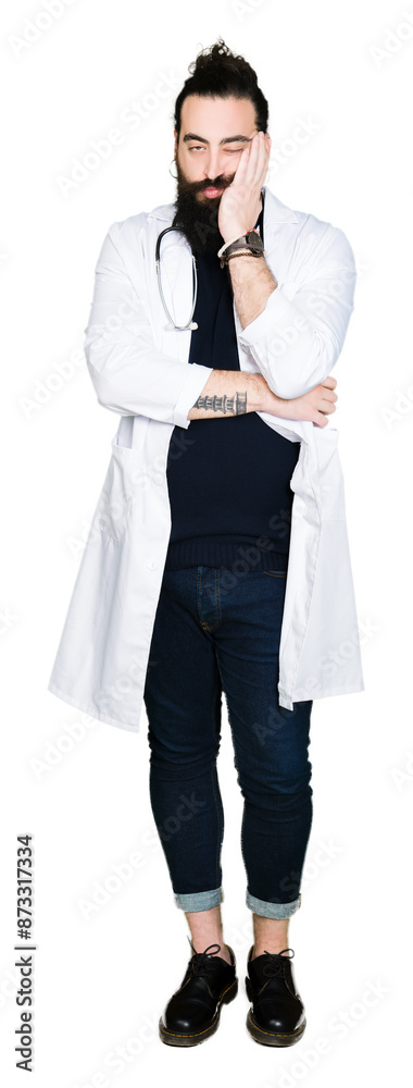 Doctor with long hair wearing medical coat and stethoscope thinking looking tired and bored with depression problems with crossed arms. Doctor with long hair wearing medical coat and stethoscope thinking looking tired and bored with depression problems with crossed arms.