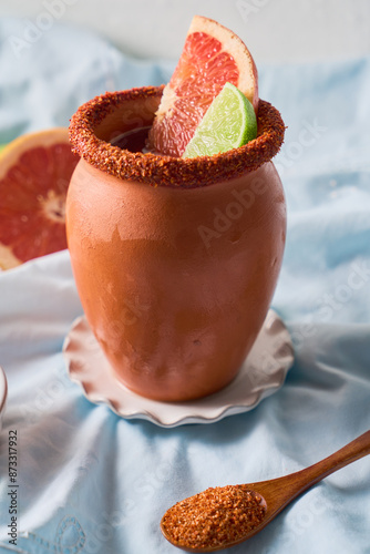 Refreshing Cantarito Drink in Authentic Clay Cup, from mexico photo