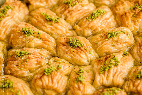 Close View of Turkish Pistachio Pastry Dessert, Baklava on a Round Tray