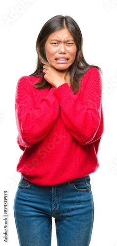 Young asian woman wearing winter sweater over isolated background shouting and suffocate because painful strangle. Health problem. Asphyxiate and suicide concept.