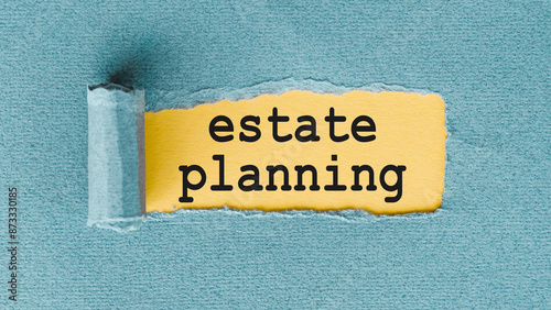 Estate Planning Written On Yellow Paper With Torn Edges