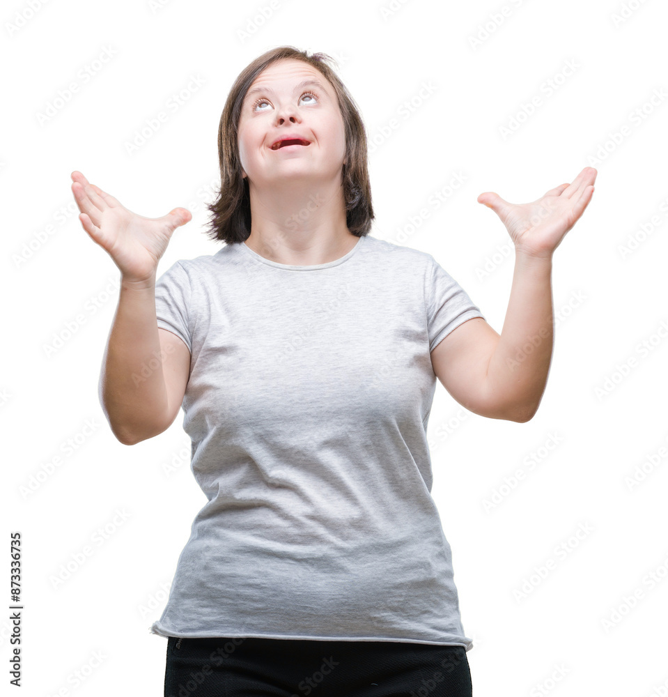 Young adult woman with down syndrome over isolated background crazy and mad shouting and yelling with aggressive expression and arms raised. Frustration concept. Young adult woman with down syndrome over isolated background crazy and mad shouting and yelling with aggressive expression and arms raised. Frustration concept.