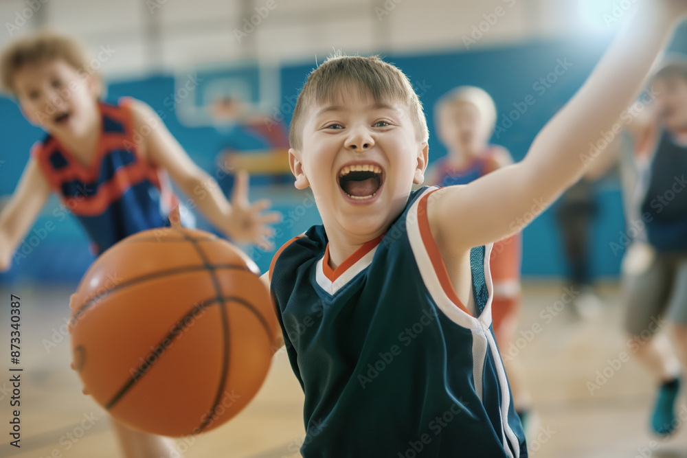 Boy with Down syndrome playing basketball with other children in a gym