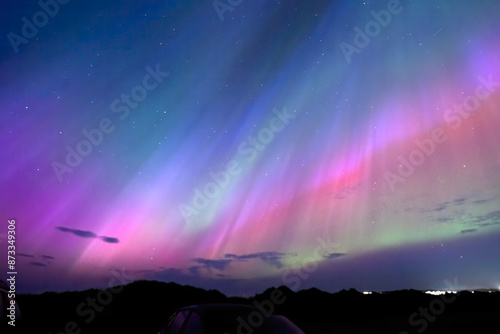 Aurora borealis, northern lights in scotland, britain bright, colourful and standing out