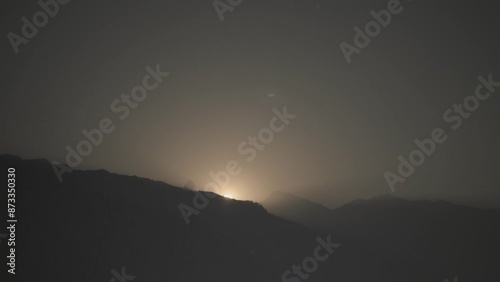 Moon Rising Timelapse behind peak in Mountains, Himalayas, Himachal pradesh, India	