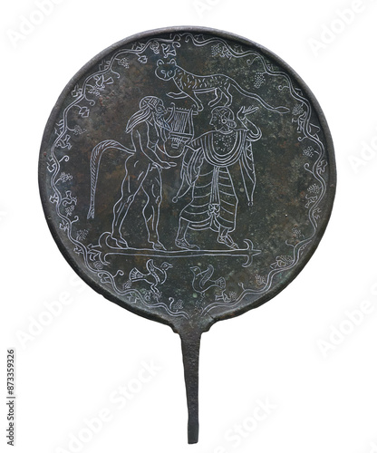 Etruscan engraved bronze mirror. Isolated photo