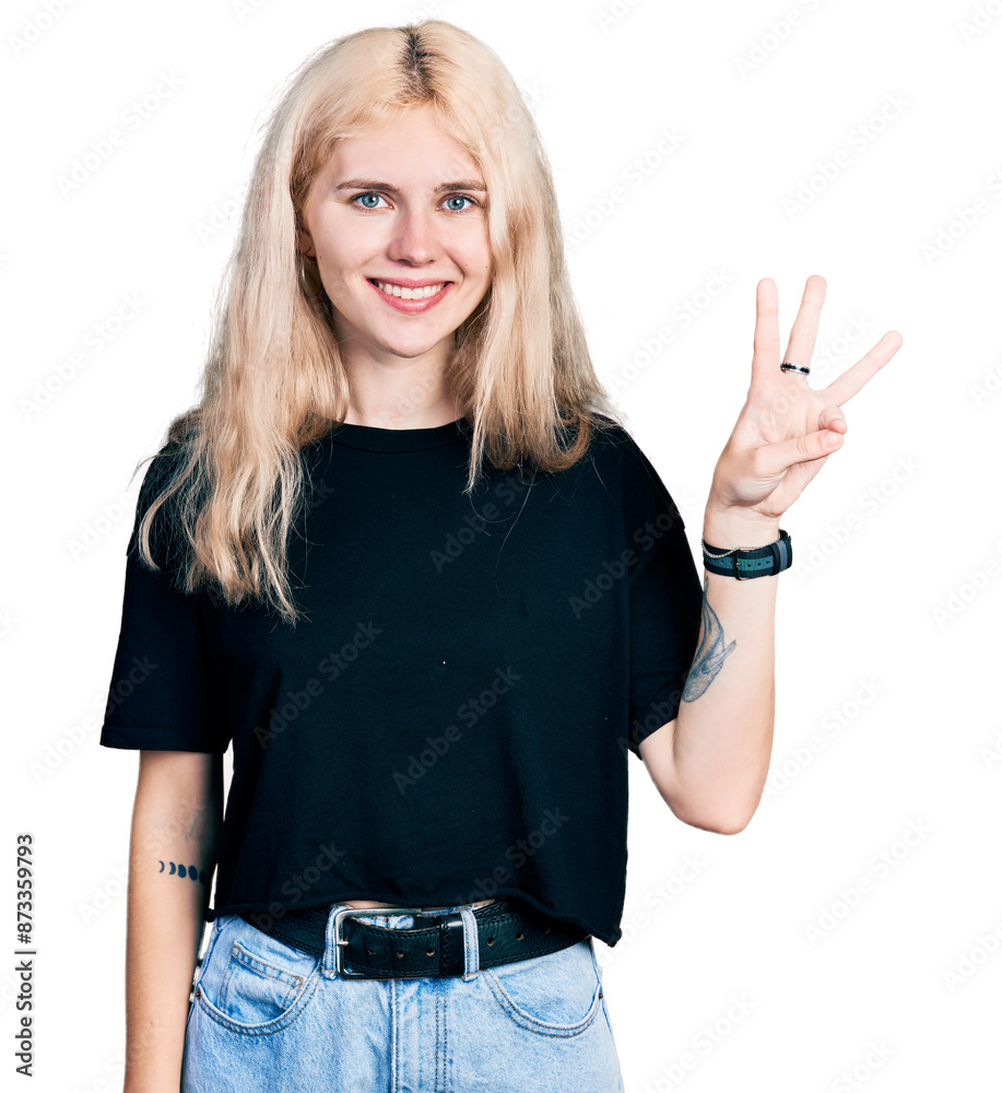 Obraz premium Young caucasian woman wearing casual clothes showing and pointing up with fingers number three while smiling confident and happy.