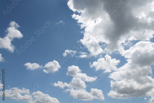 Clouds in a blue sky ,white fluffy clouds on a back ground of blue sky on a summers day Knottingley West Yorkshire In UK
 photo