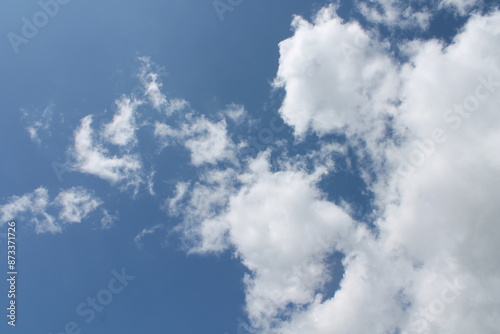 Clouds in a blue sky ,white fluffy clouds on a back ground of blue sky on a summers day Knottingley West Yorkshire In UK
 photo