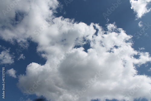 Clouds in a blue sky ,white fluffy clouds on a back ground of blue sky on a summers day Knottingley West Yorkshire In UK
 photo