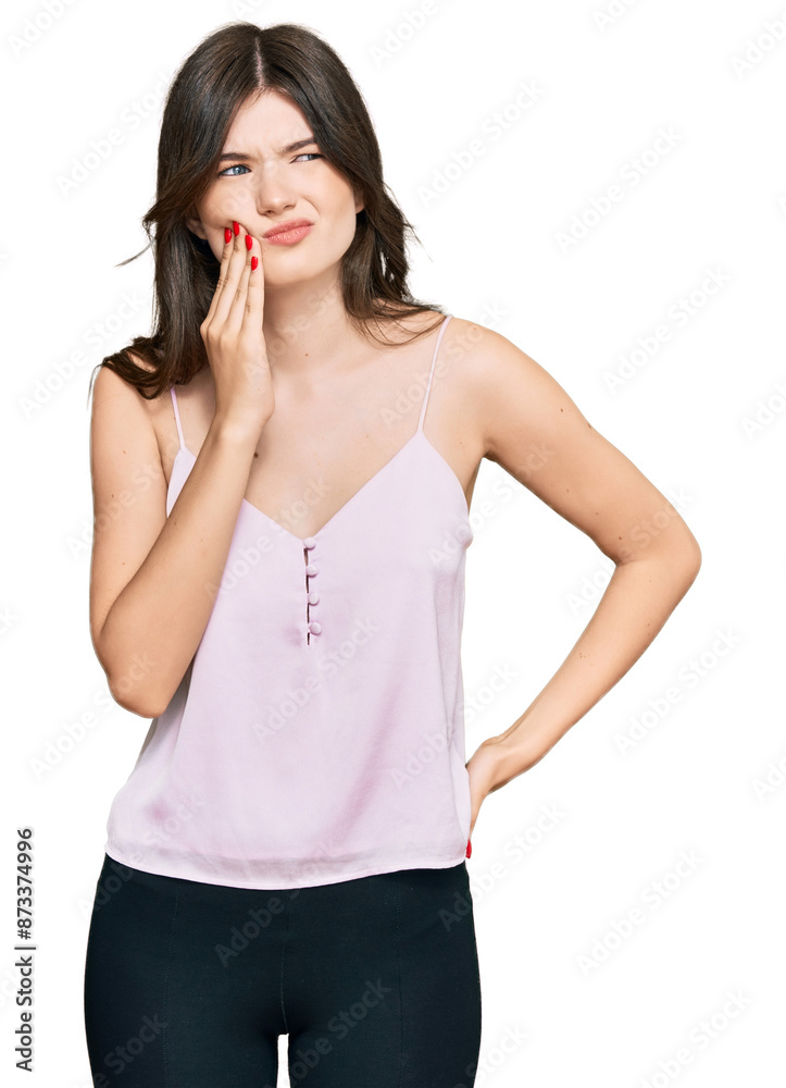 Young beautiful caucasian girl wearing casual clothes touching mouth with hand with painful expression because of toothache or dental illness on teeth. dentist Young beautiful caucasian girl wearing casual clothes touching mouth with hand with painful expression because of toothache or dental illness on teeth. dentist