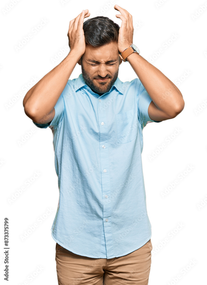 Handsome hispanic man wearing casual clothes suffering from headache desperate and stressed because pain and migraine. hands on head. Handsome hispanic man wearing casual clothes suffering from headache desperate and stressed because pain and migraine. hands on head.