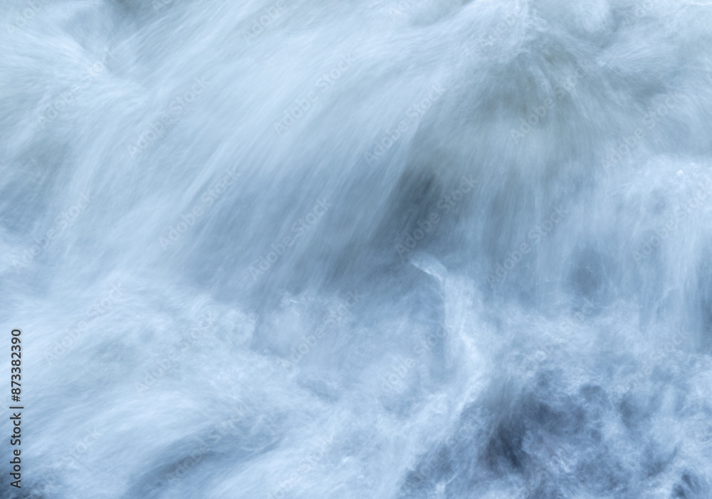 Blurred motion of flowing liquid. Abstract liquid background. Blurred motion of flowing liquid. Abstract liquid background.