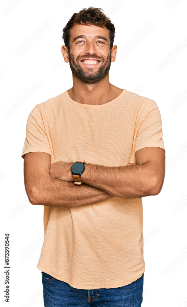 Handsome young man with beard wearing casual tshirt happy face smiling with crossed arms looking at the camera. positive person. Handsome young man with beard wearing casual tshirt happy face smiling with crossed arms looking at the camera. positive person.