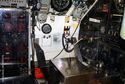 Discover the heart of an Australian submarine in Sydney, NSW. Dive into the intricate world of controls and meters, captured in this iconic photo of the submarine's driving room